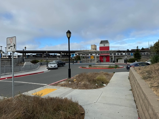 The east-side entrance to Richmond Station with a drop-off cul-de-sac, looking west on Nevin Avenue.